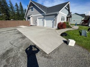 Spring driveway pressure washing removing winter stains