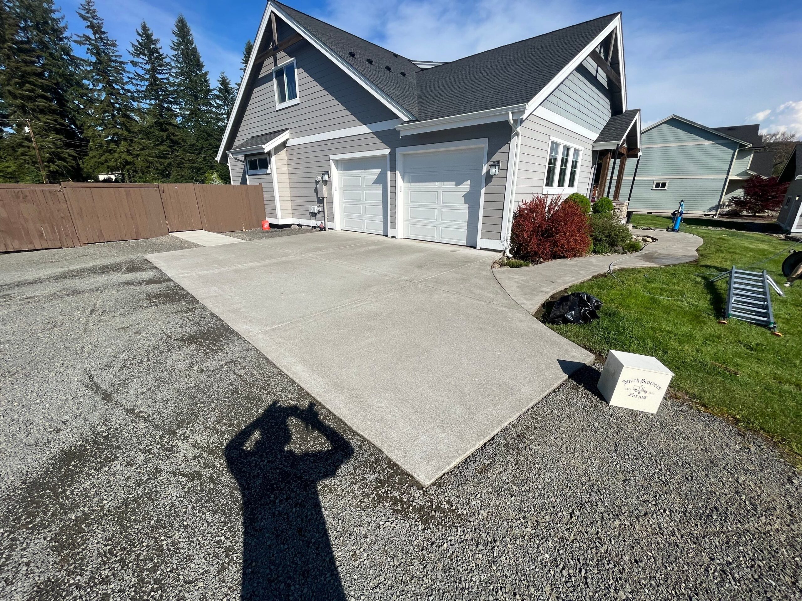 Spring driveway pressure washing removing winter stains